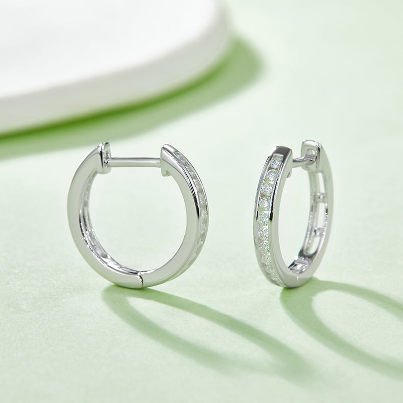 Half Pave Single-Row Moissanite Hoop Earrings in 18kt Sterling Silver