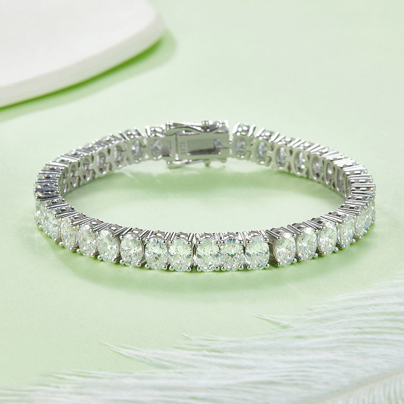 Moissanite Oval Shape Diamond Tennis Bracelet in 925 Silver with White Gold Plating