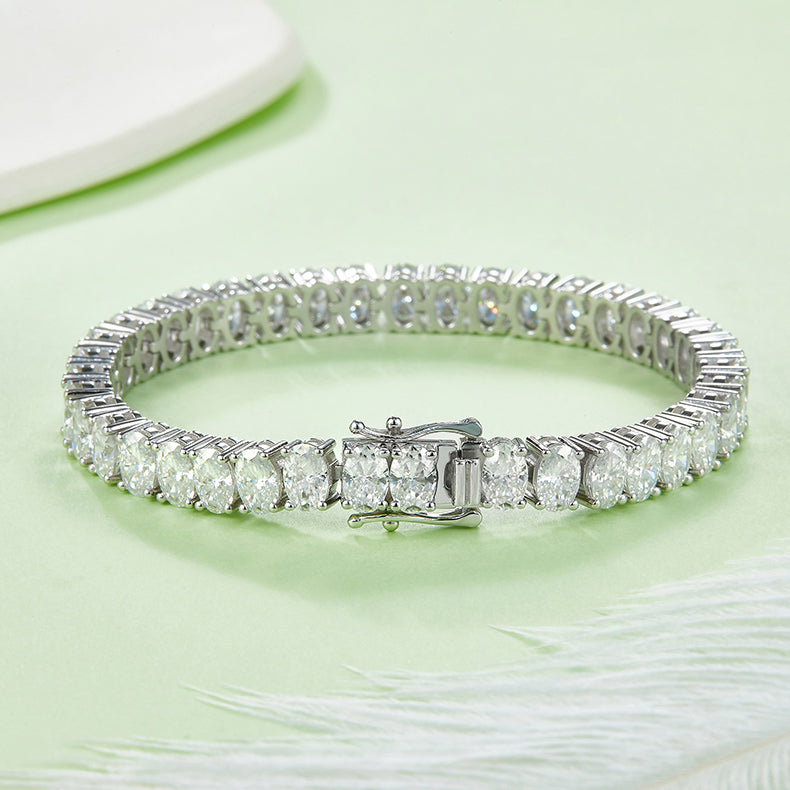 Moissanite Oval Shape Diamond Tennis Bracelet in 925 Silver with White Gold Plating