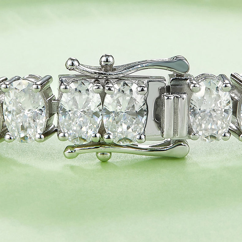 Moissanite Oval Shape Diamond Tennis Bracelet in 925 Silver with White Gold Plating