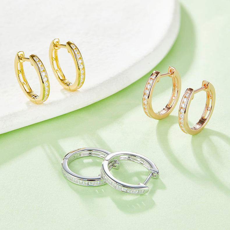 Half Pave Single-Row Moissanite Hoop Earrings in 18kt Sterling Silver